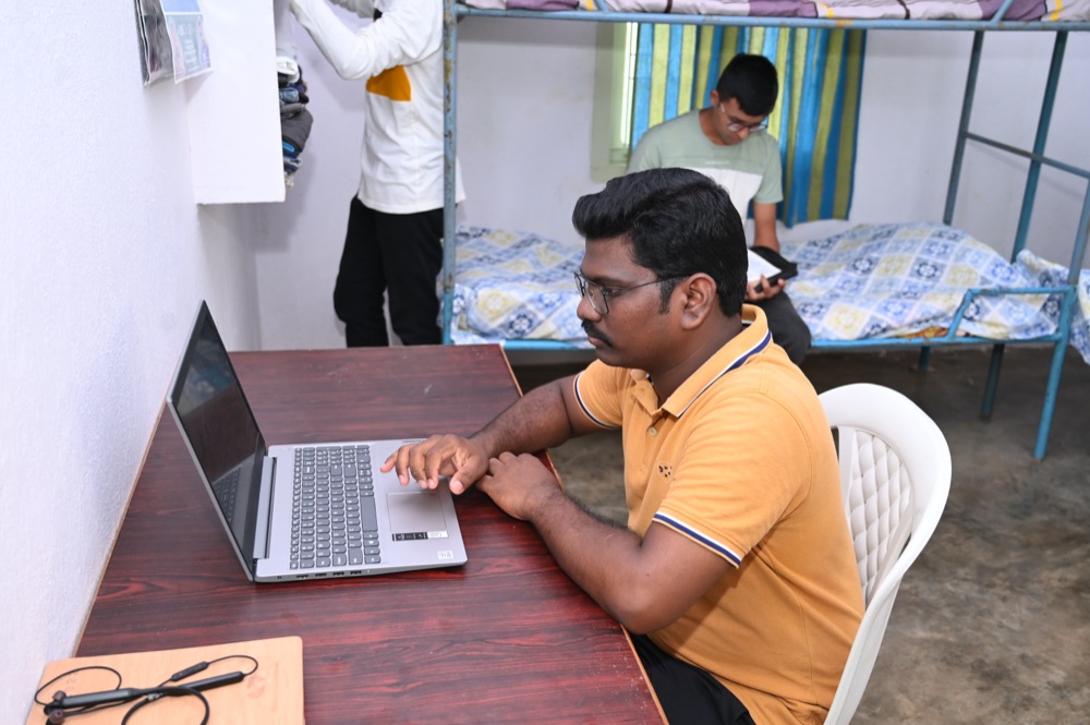 A student studying on a laptop